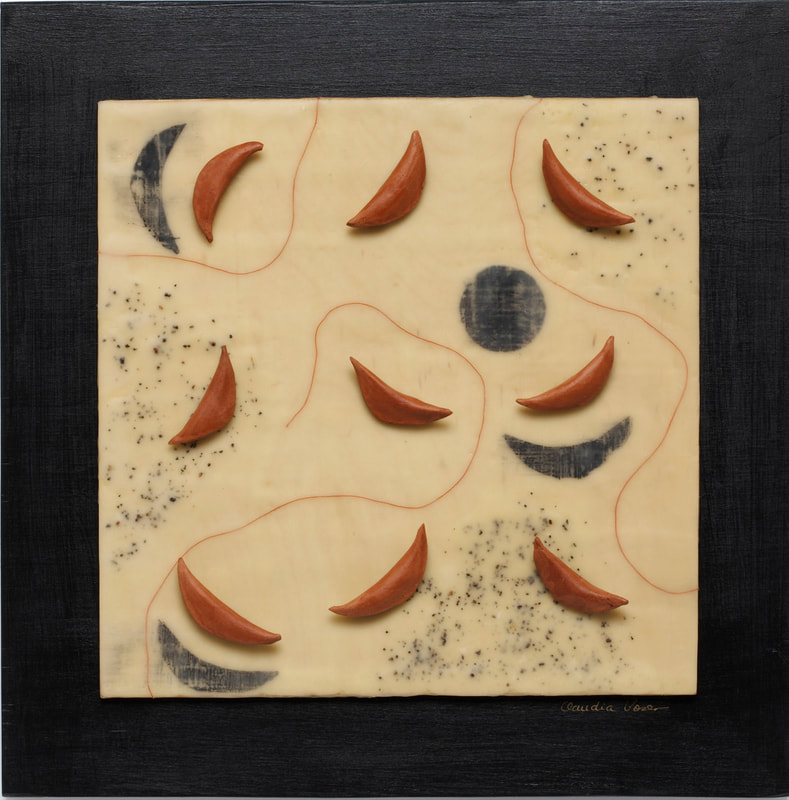 Encaustic mixed media wall piece with abstract design, coffee grounds embedded and delicate ceramic elements in black and terra cotta