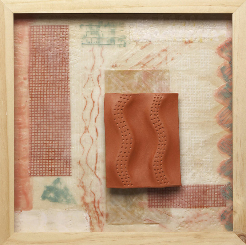 Encaustic collage in salmon green and cream with a terra cotta colored tile accent
