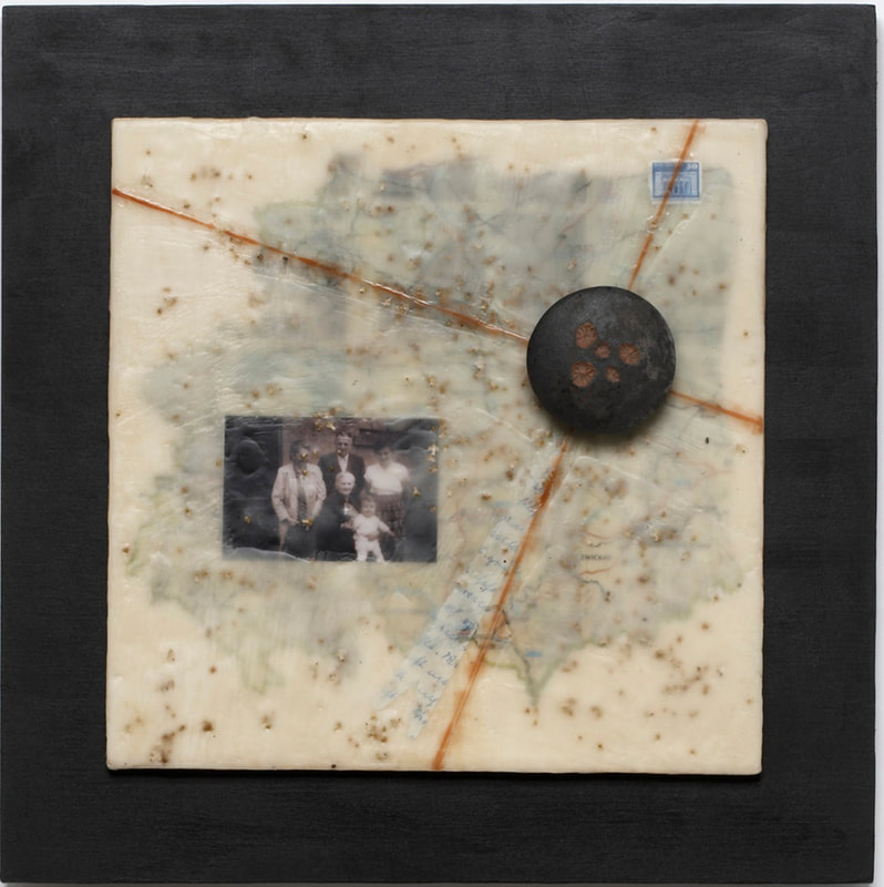 Encaustic collage with ceramic accents referencing East Germany a photograph from the fifties, letter fragment, East German stamp